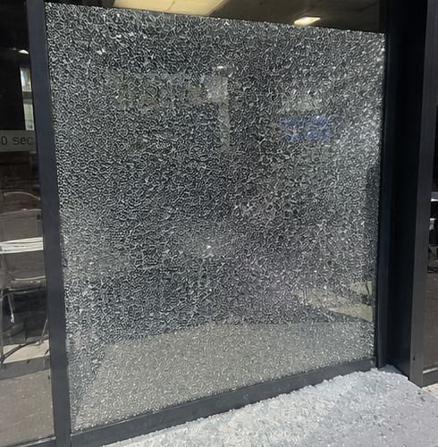 Crazed shopfront glass panel after break-in